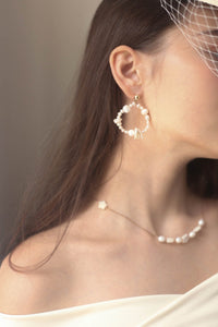 Ivoire pearl hoop earrings
