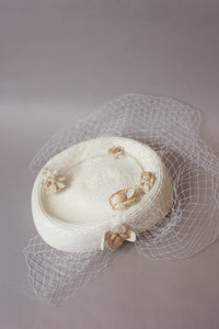 Mirabelle handwoven flowers wedding fascinator
