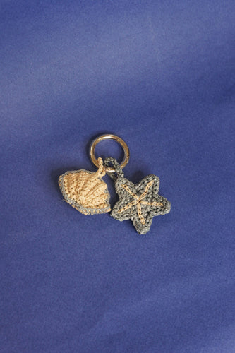 Silver starfish & raffia shell charm
