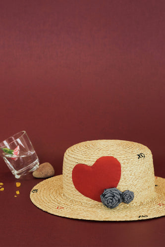 Raffia boater hat in limited edition with heart and rose decoration
