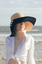 Tải hình ảnh vào Thư viện hình ảnh, Romy wide brim hat from natural raffia and black cotton canvas At the beach