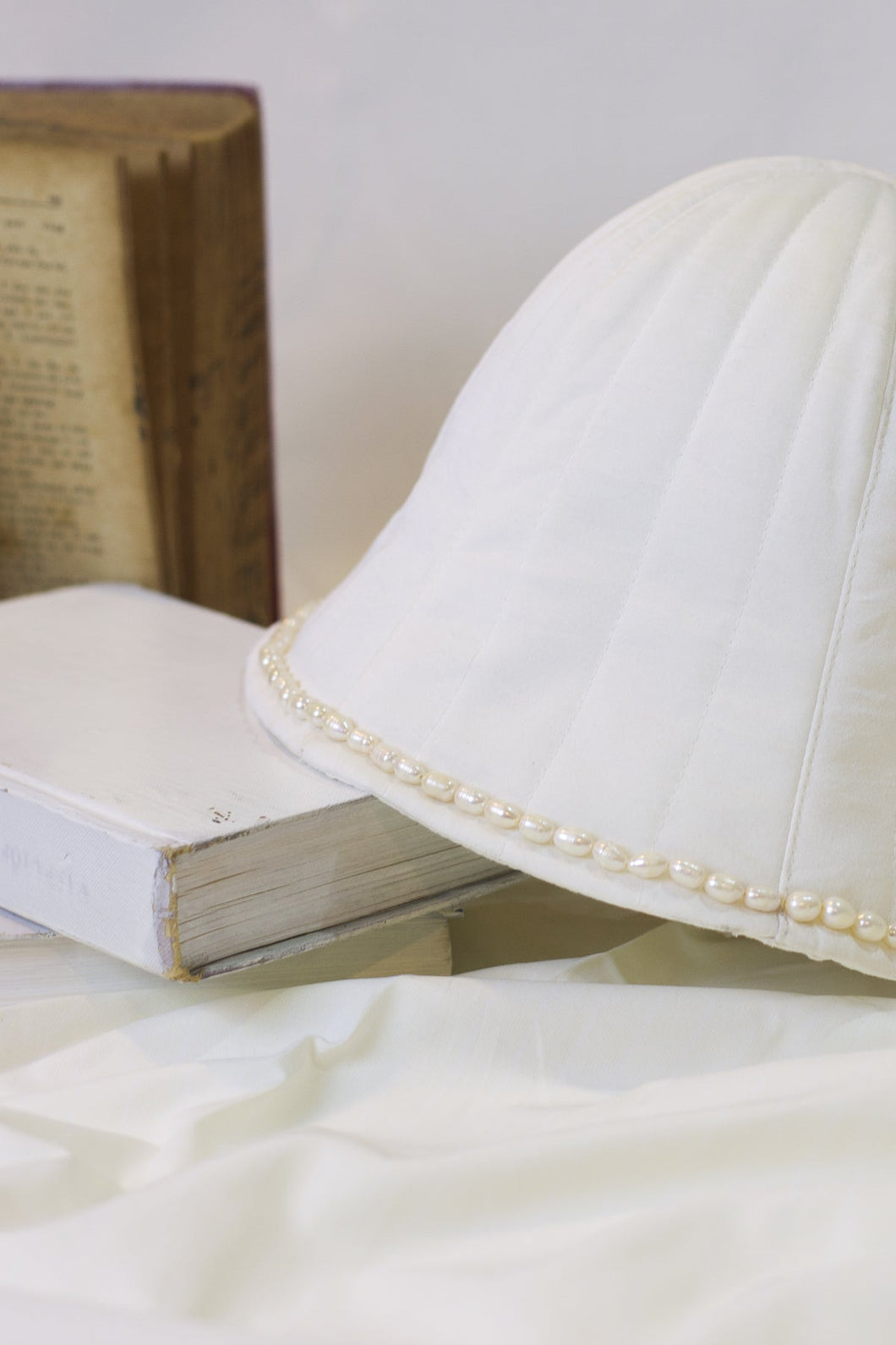 Vaud silk bucket hat with pearl brim
