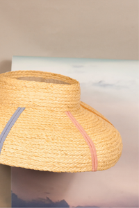 Rainbow raffia straw crownless hat with downturn brim 
