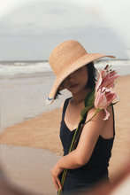 Load image into Gallery viewer, Sunrise raffia straw hat with a round crown and V-shape detail on the brim
