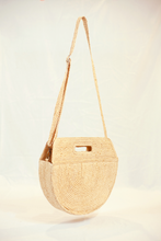 Tải hình ảnh vào Thư viện hình ảnh, When you look at marjorlie you can think of pictures of faces. The curve of the bag is sewn smooth. The outer surface is natural raffia knit creating a balance between color and shape. Thick lining.