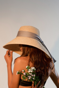 Bernadine raffia straw hat with silk laces at the back
