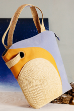 Tải hình ảnh vào Thư viện hình ảnh, The Life on Mars bag, shaped quite like a tote bag, is handcrafted from natural Raffia, surrounded by layers of premium cotton and delicately contoured. There is a &quot;secret pocket&quot; inside the raffia piece on the front.